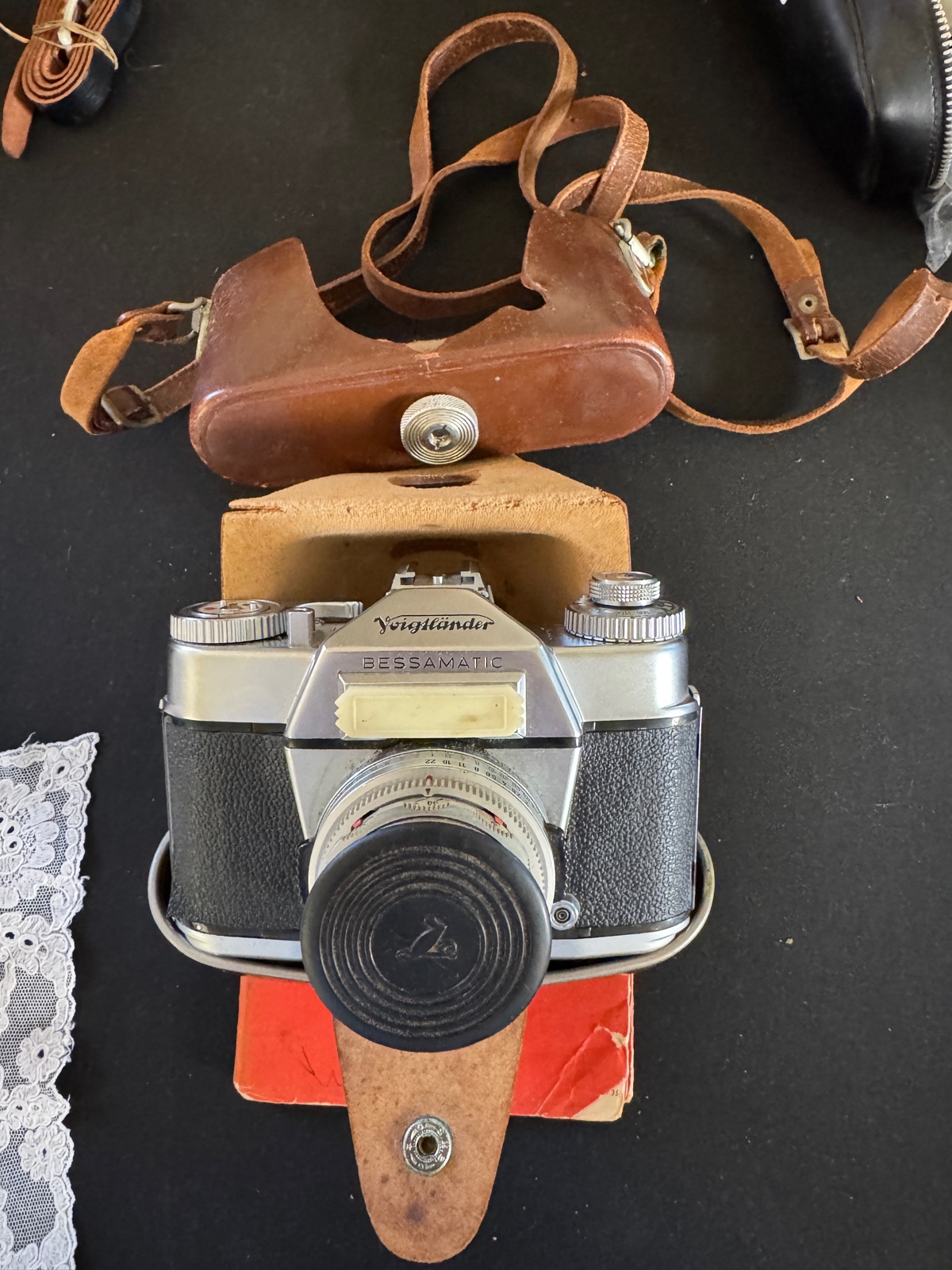 My vintage Voigtländer Bessamatic film camera with its brown leather case and strap.